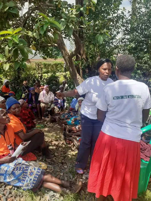 Action Smiles International with widows and widowers meeting in progress