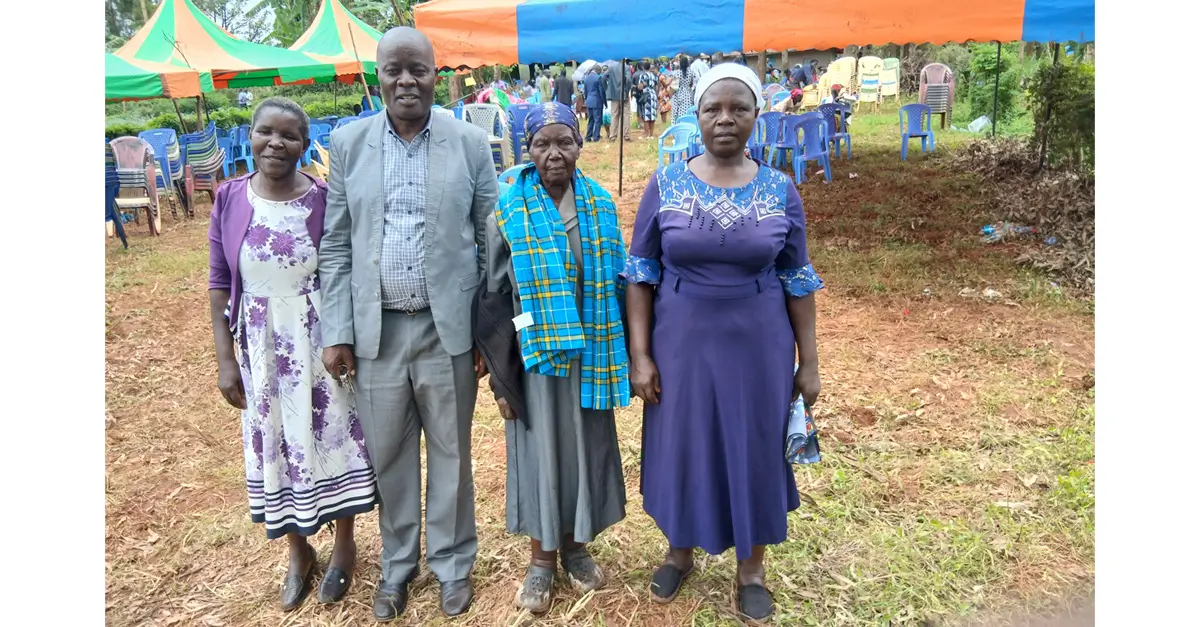 Consoling Kemunto at funeral of her sister